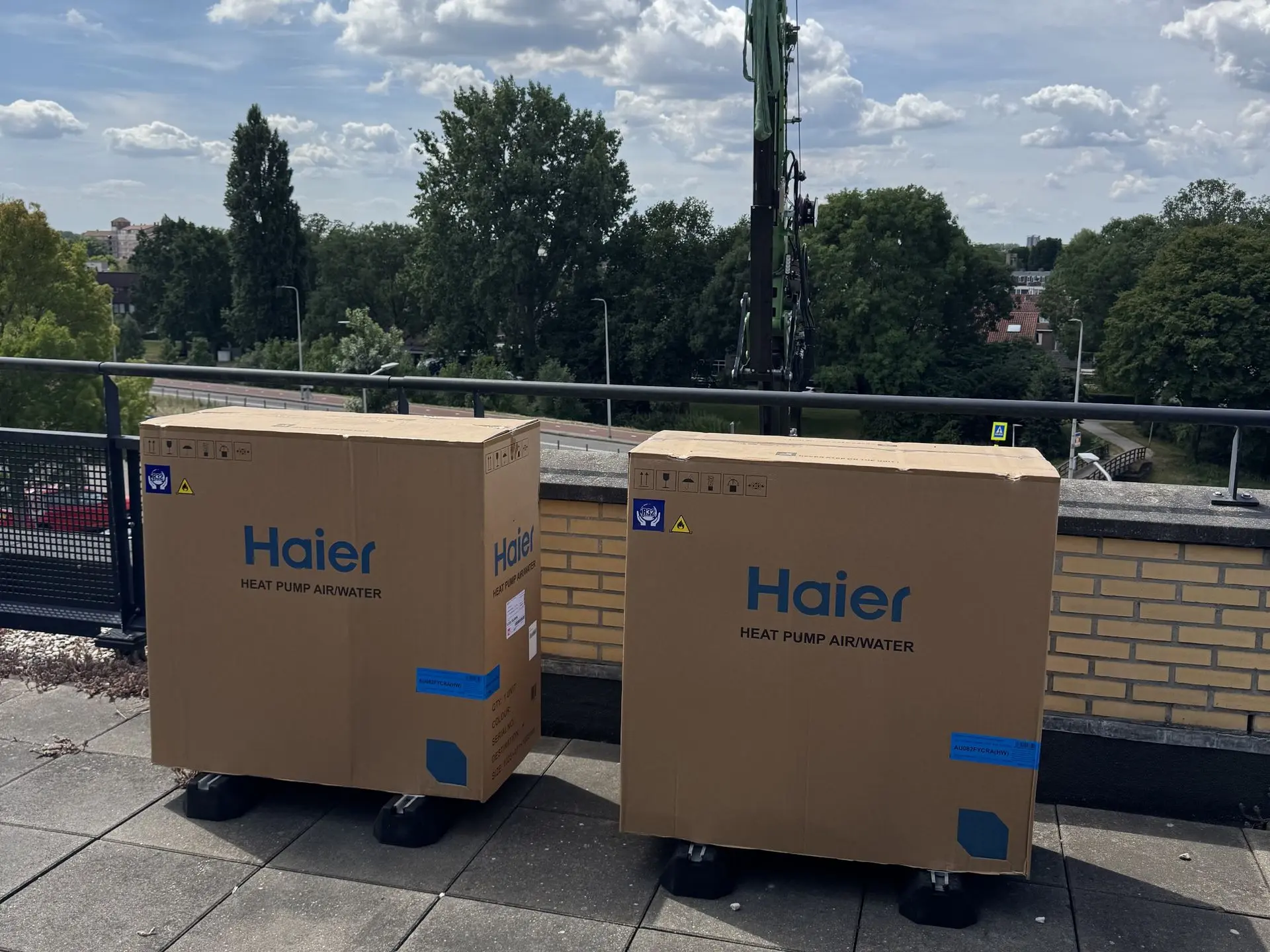 Haier heat pump equipment delivered on a roof
